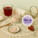 open-jar-chiffon-mask-soft-texture-relaxing-setup.webp